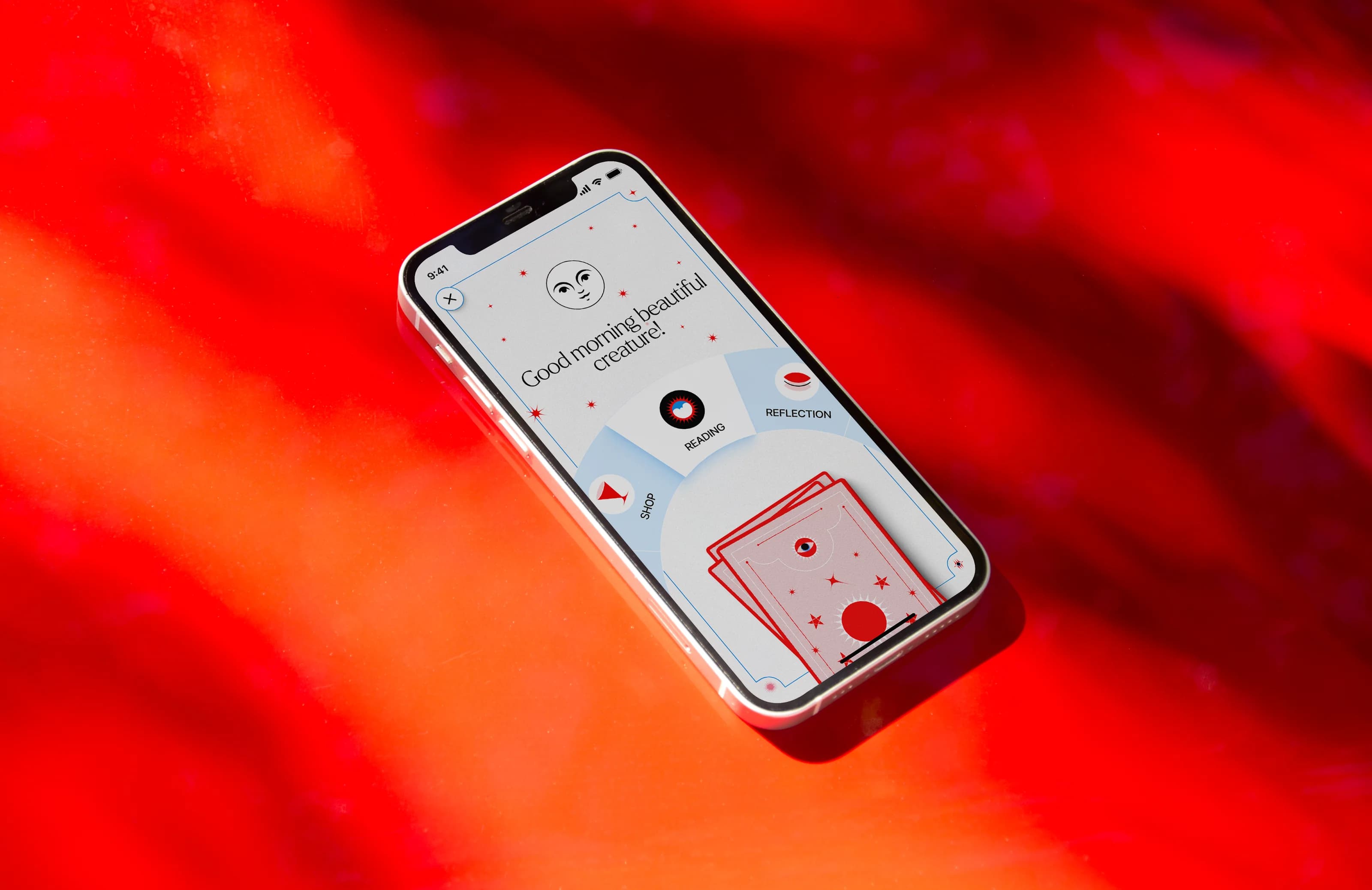 Flickerdeck app showing a tarot reading on a red surface